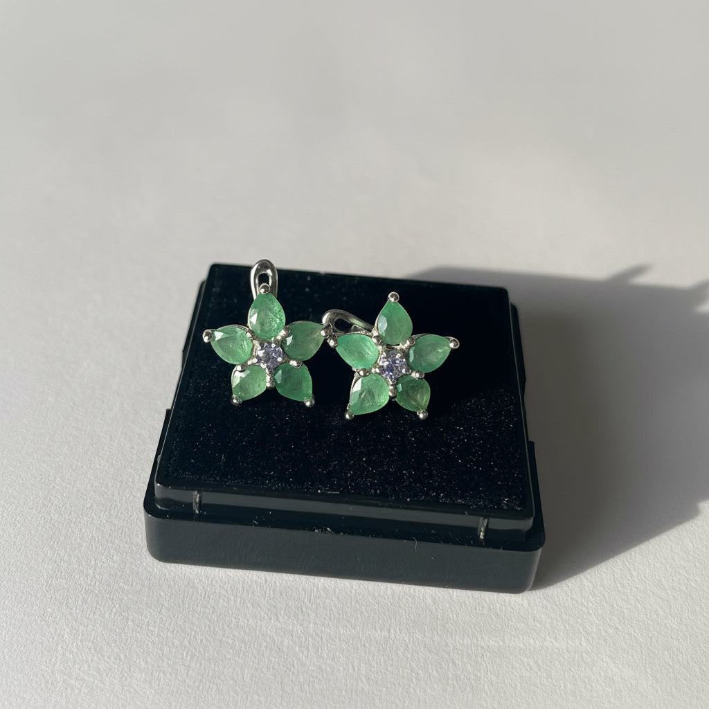 Emerald star shaped sterling silver earrings